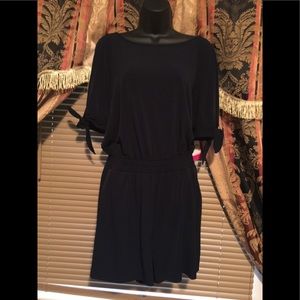 New w tags. Navy blue short one piece suit
